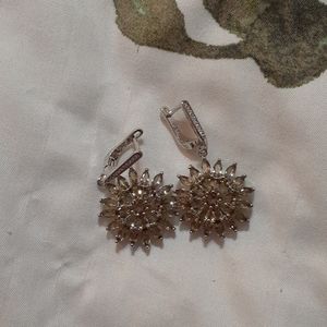 Silver flower shaped earrings